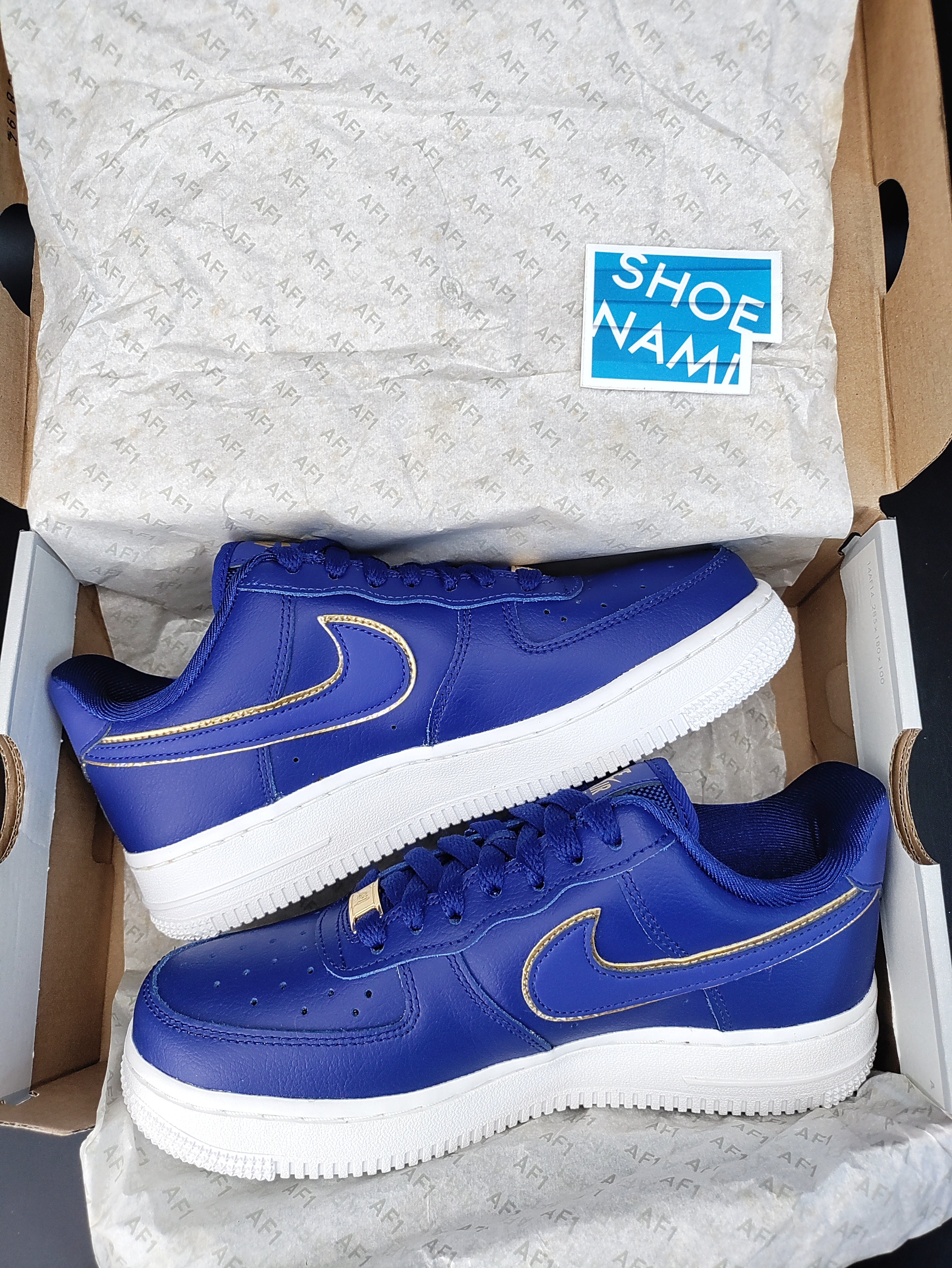 Gold and blue clearance nikes